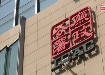 Four charged with fixing HK football matches