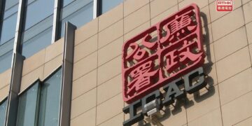 Four charged with fixing HK football matches