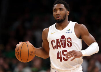 Cavs hold off Heat to clinch NBA playoff berth