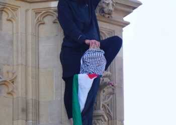 Big Ben shut as man with Palestinian flag scales tower