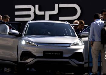 BYD posts record annual revenue, beats Tesla