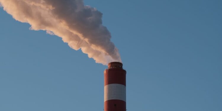 smoke from white and red factory