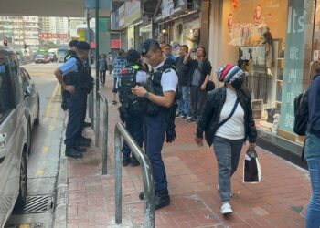 Police raid Mong Kok building ‘in murder probe’