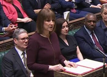 UK slashes growth forecast, cuts public spending