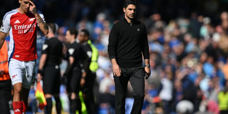 Arsenal title bid almost over after draw at Everton