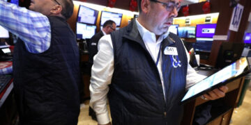 US stocks finish on upbeat tone after volatile week