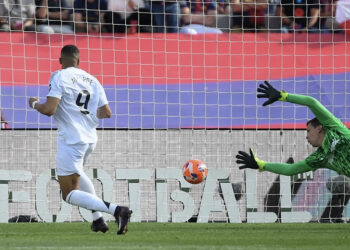 Barca edge Real in thriller to move to brink of title