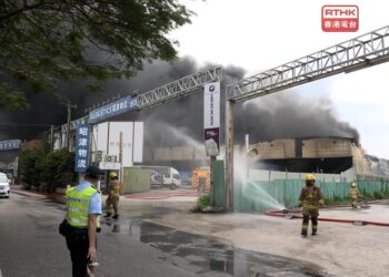 Firefighters try to contain Tin Shui Wai blaze