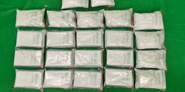 Man charged after suspected drugs found in luggage