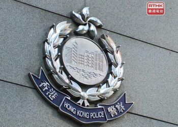 Man crushed to death between two trucks