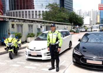 Police arrest two in illegal ride-hailing crackdown