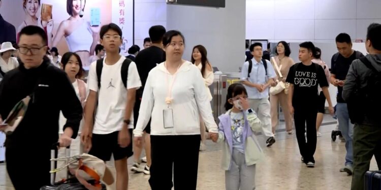 Rail station jam-packed as Golden Week begins