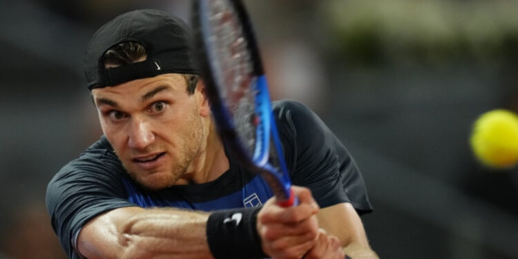 Ruud tamps down pains to face Draper in Madrid final