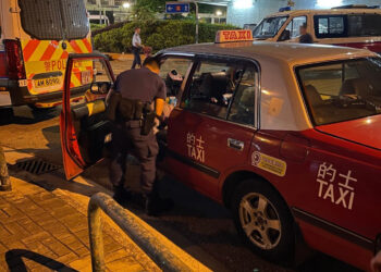 Two men held after police find cocaine in taxi