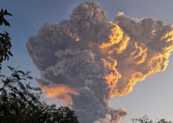 Bali hit by axed flights as volcano blows