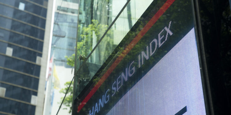 Hong Kong stocks open flat following Xi-Trump talks
