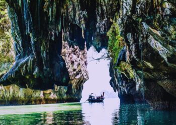 Island rivers carve passageways through coral reefs