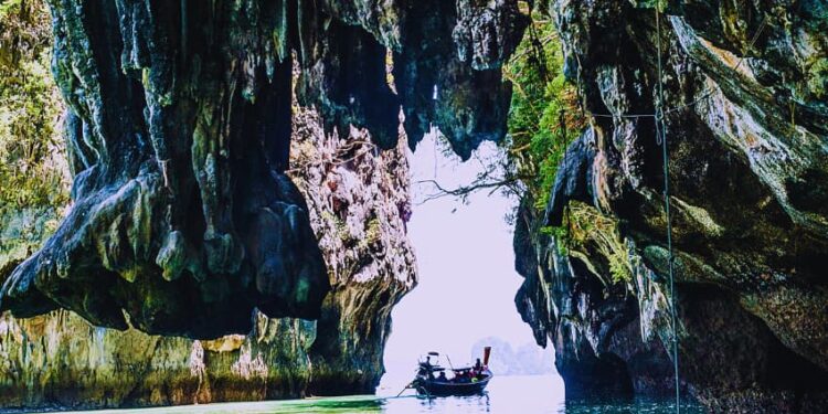 Island rivers carve passageways through coral reefs