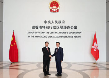 John Lee pays visit to new liaison office chief