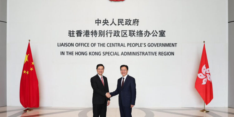 John Lee pays visit to new liaison office chief