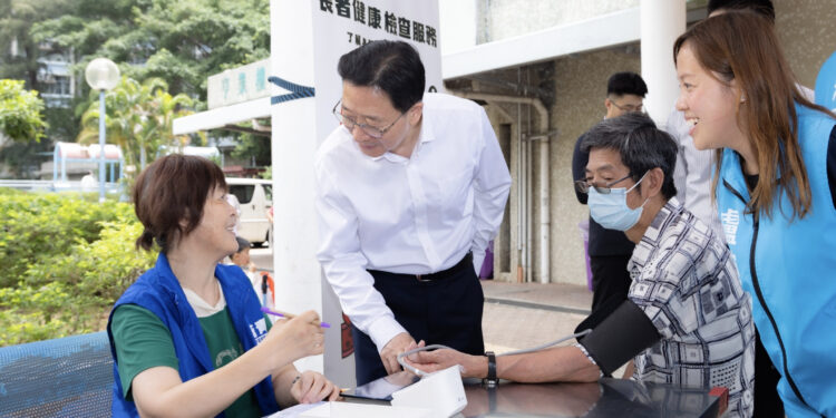 Liaison office director Zhou Ji pays district visits