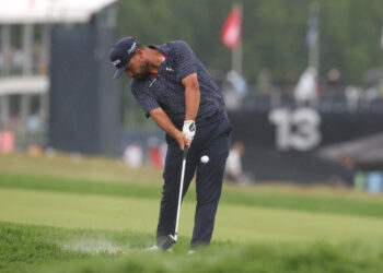 Spaun wins US Open and first major with monster putt