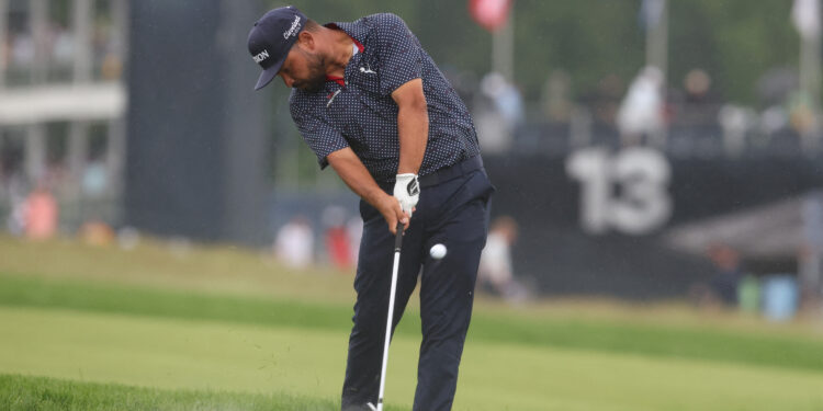 Spaun wins US Open and first major with monster putt