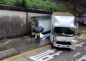 Woman killed as truck slams into Hung Hom bus stop