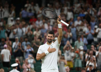 Djokovic opens 25th Grand Slam bid with win