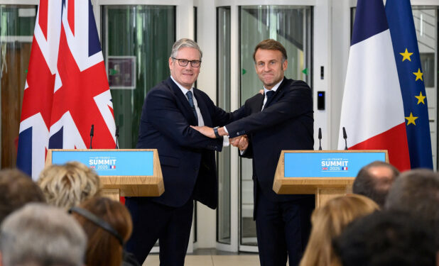 UK, France unveil migrants deal