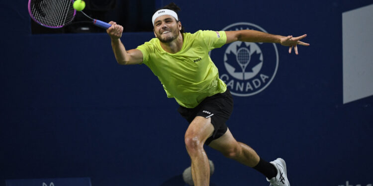 Fritz squeezes through in Toronto marathon