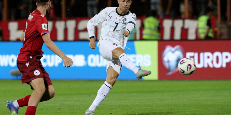 Portugal cruise, England flat in World Cup qualifying
