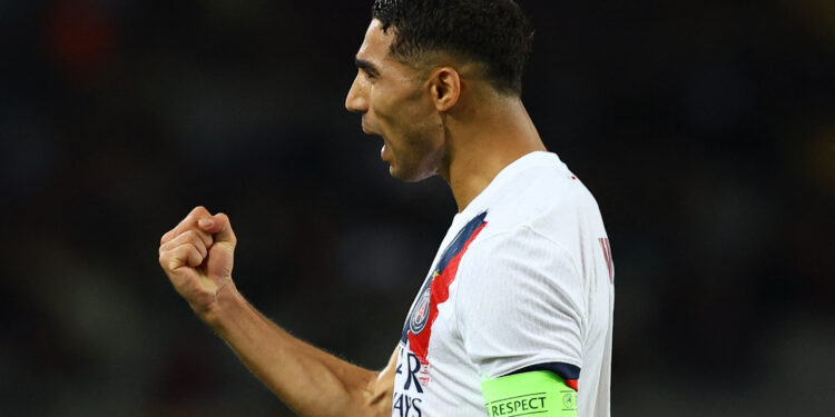 Champions League holders PSG strike late at Barca