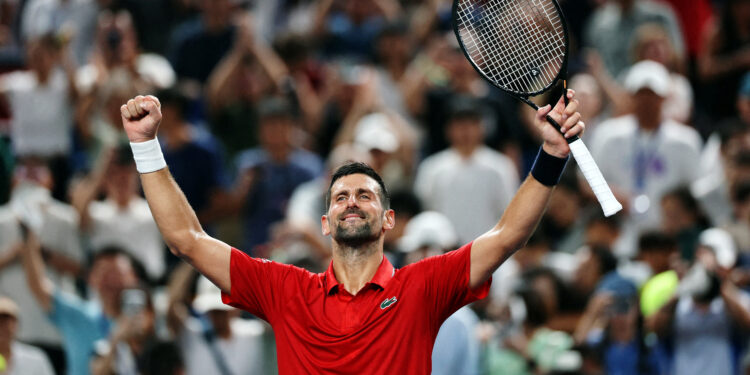 Djokovic overcomes injury scare to advance in Shanghai