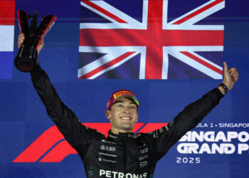 Russell wins Singapore GP as McLaren seals title