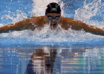 Angus Ng ends run in NG men’s singles top eight