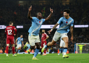Man City sink Liverpool to mark Guardiola milestone