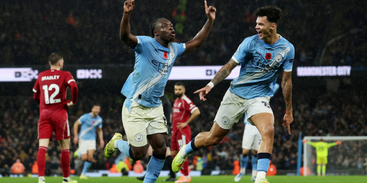 Man City sink Liverpool to mark Guardiola milestone