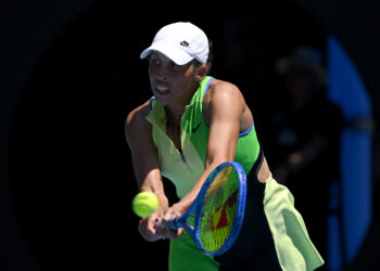 Keys hangs on in Australian Open title defence opener