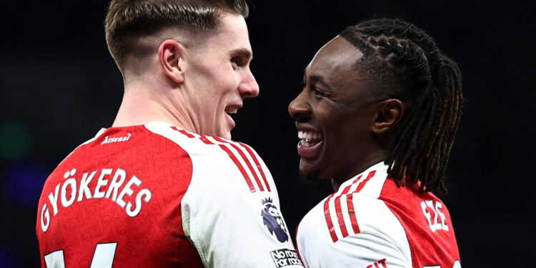 Arsenal sink rivals Spurs to reignite title hopes