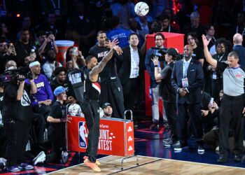 Injured Lillard wins NBA long-distance shootout