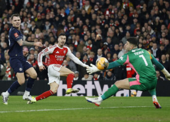 Quadruple chasing Arsenal rout Wigan in FA Cup