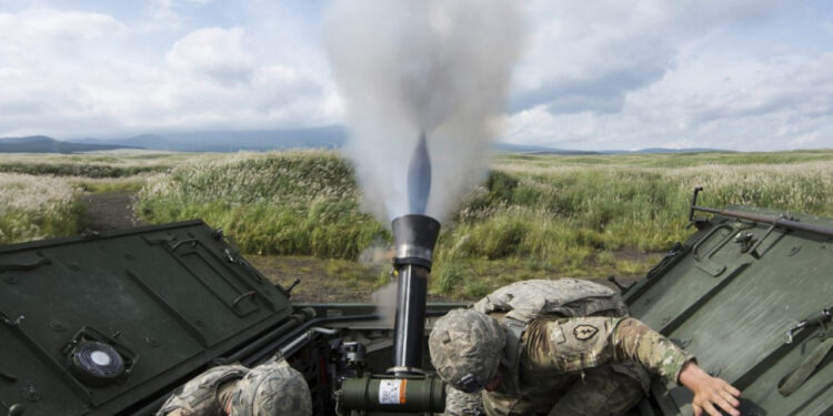 Japan set on long-range missiles in midnight move