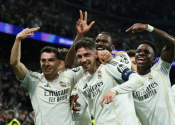 Real win in Champions League last 16; Arsenal held