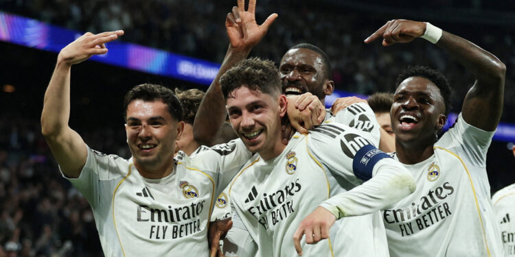 Real win in Champions League last 16; Arsenal held